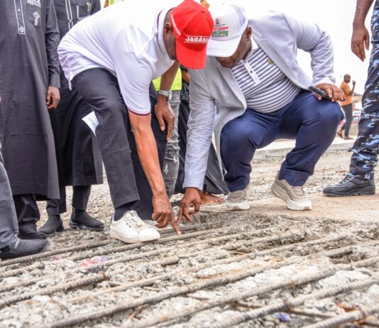 Samuel Anyanwu Attachments7:38 AM (5 hours ago) to me **FEDERAL MINISTRY OF WORKS** **PRESS RELEASE** Federal Government Commends Progress on Abuja-Kaduna-Kano Road, Section I, Phase 1. The Honourable Minister of State for Works, Bello Muhammad Goronyo, Esq., expressed his satisfaction with the progress and quality of work on the Abuja-Kaduna-Kano Road (Zuba Section). He commended the contractor, Messrs Infiouest (Nig.) Limited for its professionalism and alignment with President Bola Ahmed Tinubu's Renewed Hope Agenda. During an inspection tour, the Minister announced that approximately six (6) kilometres-three (3) kilometres on each side had already been completed using reinforced rigid concrete pavement. “The quality of work delivered so far reflects the President’s unwavering commitment to national development through robust infrastructure,” he stated. He praised the dedication of the workforce and the use of modern equipment, saying, “The commitment of the workers is commendable. I salute their resilience and their support for Mr. President's vision. “The Minister emphasised that once completed, the road will reduce travel time, improve safety, curb insecurity, enhance trade, and create employment opportunities. Regarding the quality of construction materials, the Minister remarked, “What we are seeing here is superb. The reinforced rigid pavement is expected to last 50 to 100 years superior to conventional asphalt.” Mr. Robert Turner, the Project Manager and Representative of the construction company reaffirmed its commitment to delivering a world-class project. “There are no shortcuts. We are giving our very best to achieve the project’s goals,” he stated. Turner highlighted that the team operates daily from 6:00 a.m. to as late as 9:00 p.m., constrained only by security concerns along the corridor. “We have a spirited and dedicated team. Despite challenges, we are fully focused on delivering this critical project within record time,” he added. Earlier in his remarks, the Permanent Secretary of the Federal Ministry of Works, Engr. Olufunsho O. Adebiyi, emphasised the strategic importance of adopting rigid pavement technology, especially given Nigeria’s soil composition, water table level, and high axle loads. “Rigid pavement is new to Nigeria, but it has become necessary due to the consistent failure of flexible pavements under our local conditions,” he explained. He cited previous challenges with bitumen and cement interactions that compromise flexible pavements, particularly in high-traffic corridors like the Apapa-Oworonshoki Expressway in Lagos state. “This new method, reinforced with Y20 steel bars at 200mm centres, is stronger than most bridge decks,” he noted. Adding that “It is a sustainable solution that will outlast many of us and withstand the test of time.” Engr. Adebiyi urged road users to be patient during the construction period, assuring them that the phased opening of completed sections will help minimise disruptions. “We understand the temporary discomfort, but in the end, this road will significantly improve lives and the economy.” The Zuba section of the Abuja-Kaduna-Kano road remains a critical link in Nigeria’s transport network, and the Federal Government has reaffirmed its determination to ensure its successful and timely delivery. *Mohammed A. Ahmed,* Director, Press and Public Relations. 4th May 2025. L-R: The Honourable Minister of State Works, Bello M. Goronyo Esq. and the Permanent Secretary of the Ministry, Engr. Adebiyi O. Olufunsho inspecting the ongoing construction of Abuja-Kaduna-Kano dual carriage Road, Zuba section constructed by the Infiouest Construction Company, Abuja today 3rd May, 2025