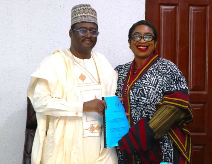 L-R: THE NEW PS, DR MUKHTAR YAWALE MUHAMAD AND THE DOOPS, MRS UGOCHI AKUDO-NWOSU