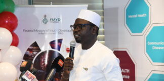 Hon. Minister of Youth Development, Comrade Ayodele Olawande presenting speech at the launch of YO! HEALTH Initiative in Abuja today.