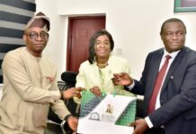 L-R: Director-General, Bureau of Public Procurement (BPP) Dr. Adebowale A. Adedokun, MCIPS, ACFE presenting a souvenir to President, Chartered Institute of Logistics and Transportation, Amb. Anthonia Ekpa while the Chairman, FCT Chapter of the Institute, Dr. Emmanuel onwudi assisted her during the courtesy visit by the CILT to the Bureau in Abuja