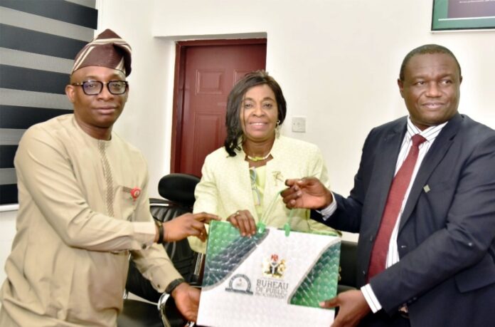 Procurement cycle L-R: Director-General, Bureau of Public Procurement (BPP) Dr. Adebowale A. Adedokun, MCIPS, ACFE presenting a souvenir to President, Chartered Institute of Logistics and Transportation, Amb. Anthonia Ekpa while the Chairman, FCT Chapter of the Institute, Dr. Emmanuel onwudi assisted her during the courtesy visit by the CILT to the Bureau in Abuja