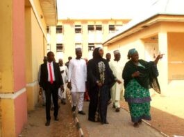 The honourable Minister of State for Education Prof Suiwaba Sa'id Ahmad inspecting Federal Government College Kano with Principal on her left and others