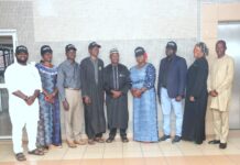 Members of the ACTU Committee led by its Chairman Alhaji Abubakar Othman with the Director, Information and Public Relations, Mohammed Manga in a group photograph shortly after launching the staff sensitization campaign on Friday at the Ministry's Headquarters, Abuja