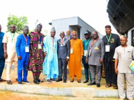 7th from Left : Reprentative of Surveyor General of the Federation Sur Semiu Ayinde , on his left is NIS,President Matthew O Ibitoye and others in a group picture shortly after the opening ceremony