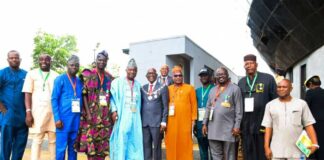 7th from Left : Reprentative of Surveyor General of the Federation Sur Semiu Ayinde , on his left is NIS,President Matthew O Ibitoye and others in a group picture shortly after the opening ceremony