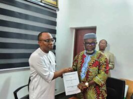 The Executive Chairman of Fiscal Responsibility Commission (FRC), Victor Chinemerem Muruako Esq. presenting their proposed MoU document to the DG-BPP, Dr. Adebowale A. Adedokun FCIPS, ACFE after a fruitful deliberation.
