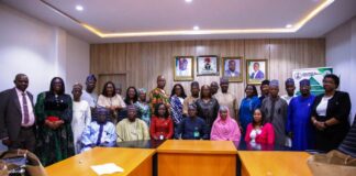 The Permanent Secretary of the Ministry of Communication Innovation and Digital Economy Mr Adeladan Rafiu Olarinre in a group photograph with the Head of Service of the Federation with other Dignitaries on a field visit on the ECM implementation today 23rd June, 2025 at the Permanent Secretary's conference room 6th floor, Federal Secretariat Abuja.
