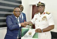 L-R: Director-General, Bureau of Public Procurement (BPP) Dr. Adebowale A. Adedokun, FCIPS, ACFE presenting a souvenir to the Commandant, Nigerian Navy Logistics College, NNLC, Rear Admiral EC Anakwe during his visit to BPP