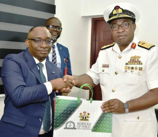 L-R: Director-General, Bureau of Public Procurement (BPP) Dr. Adebowale A. Adedokun, FCIPS, ACFE presenting a souvenir to the Commandant, Nigerian Navy Logistics College, NNLC, Rear Admiral EC Anakwe during his visit to BPP