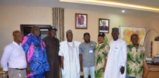 4th from L: RMAFC Chairman, Dr. Mohammed Bello Shehu OFR; 5th L: Newly Elected Chairman, NSCU RMAFC Chapter, Comrade Mohammed Rabiu Enagi; 6th L: Rep of the National Chairman, Comrade Ganiyat Adeogun and other Union Members at the RMAFC Headquarters, Abuja