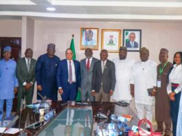 The Hon. Minister of State for Industry, FMITI, Sen John Owan Enoh(middle), The Executive Secretary, National Sugar Development Council (NSDC), Kamar Bakri (sixth left), the Chaireman, Golden Sugar Refinery, John Coumantaros (fifth left), the Managing Director, Bua Group, Ayodele Abioye (fourth left) and other stakeholders in a group photograph at the meeting on the backward Integration of sugar production in Abuja.