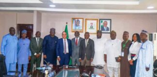 The Hon. Minister of State for Industry, FMITI, Sen John Owan Enoh(middle), The Executive Secretary, National Sugar Development Council (NSDC), Kamar Bakri (sixth left), the Chaireman, Golden Sugar Refinery, John Coumantaros (fifth left), the Managing Director, Bua Group, Ayodele Abioye (fourth left) and other stakeholders in a group photograph at the meeting on the backward Integration of sugar production in Abuja.