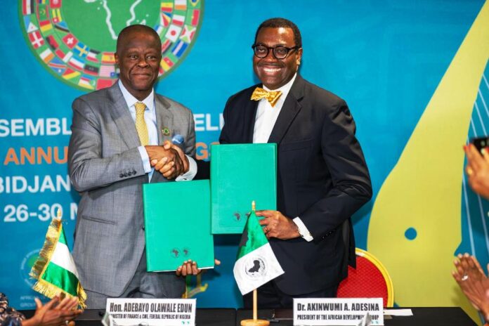 Trust Fund L-R: Honourable Minister of Finance and Coordinating Minister of the Economy Mr Wale Edun, OFR with the outgoing AfDB President Dr Akinwumi Adesina shortly after signing the agreement in Abidjan