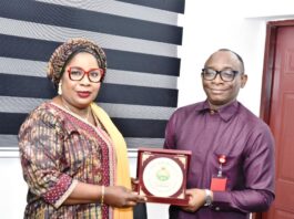 Right: Director-General, Bureau of Public Procurement (BPP) Dr. Adebowale A. Adedokun, FCIPS, ACFE, receiving a plaque from the President, Nigerian Society of Engineers (NSE), Engr. Margaret Aina Oguntala, FNSE, during her visit to BPP in Abuja