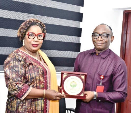 Right: Director-General, Bureau of Public Procurement (BPP) Dr. Adebowale A. Adedokun, FCIPS, ACFE, receiving a plaque from the President, Nigerian Society of Engineers (NSE), Engr. Margaret Aina Oguntala, FNSE, during her visit to BPP in Abuja