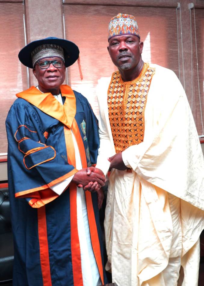Excellent Leadership Award11 The Hon. Minister, Ministry of Regional Development, Engr. Abubakar Momoh being conferred with the prestigious "Excellent Leadership Award" and "Professional Doctorate Fellowship Award" by the Executive Secretary/ National Coordinator of the Institute of Professional Economists and Management Policy, Dr. Musa Aliu Yakub Okhumeode, in his Office, Abuja.