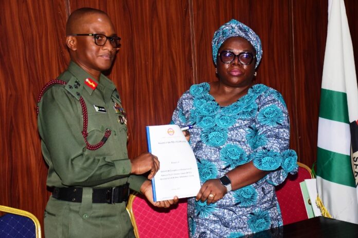 Improvements In The National Youth Service Corps Orientation The Representative of the National Coordinator SERVICOM Presidency Office , Mr . Anthony oshin, Mrs Ngozi Akinbodewa presenting the report to the Director General National Youth Service Corps, Brigadier General Olakunle Nafiu, today at the NYSC Headquarters Office, Abuja