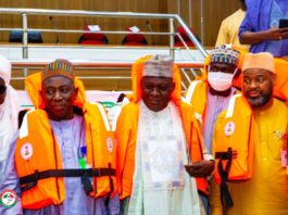 L-R: In life jackets, Assistant Director, Information & PR (rep. Honourable Minister, Federal Ministry of Marine and Blue Economy) Muhammad Zakari MFR, Deputy Governor, Zamfara State, Mani Mammuni, Secretary to the State Government, Zamfara State, Abubakar Nakwada at the official Handing over of life jackets, in Gusau, Thursday,10th July, 2025.