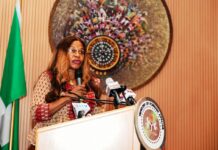 Permanent Secretary, Service Welfare Office (OHCSF), Mrs. Patience Oyekunle delivering her keynote address at the Sensitization Workshop.
