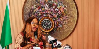 Permanent Secretary, Service Welfare Office (OHCSF), Mrs. Patience Oyekunle delivering her keynote address at the Sensitization Workshop.