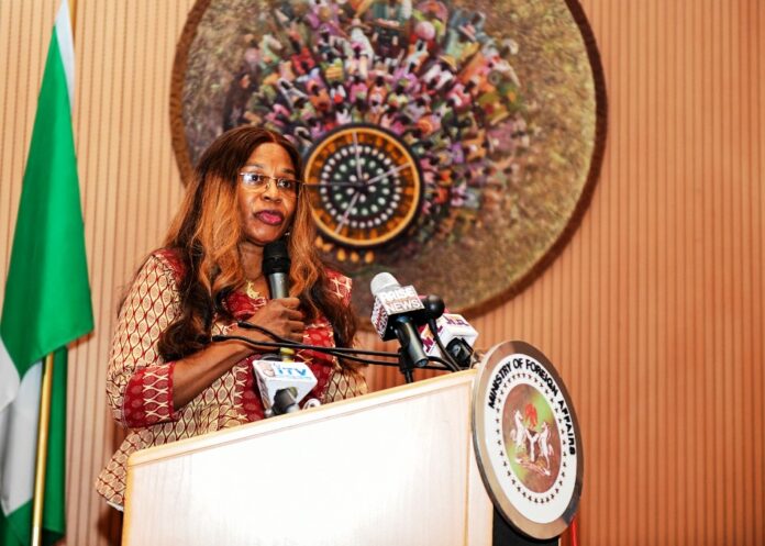 Permanent Secretary, Service Welfare Office (OHCSF), Mrs. Patience Oyekunle delivering her keynote address at the Sensitization Workshop.