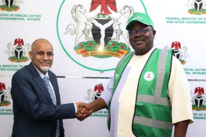PS FMSDIGA, Dr. Onwusoro Maduka Ihemelandu with Director Saleem Muhammad of PENCOM