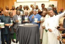 The Minister of Agriculture and Food Security, Sen Abubakar Kyari (C), and other stakeholders during the launch.