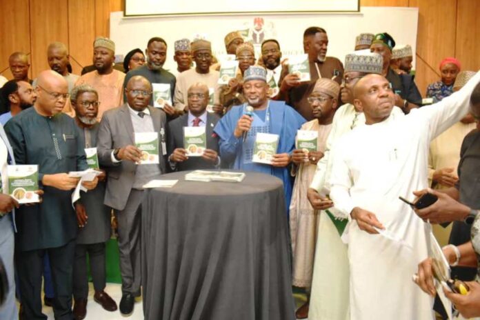 National Soyabean Production Policy And Strategy The Minister of Agriculture and Food Security, Sen Abubakar Kyari (C), and other stakeholders during the launch.
