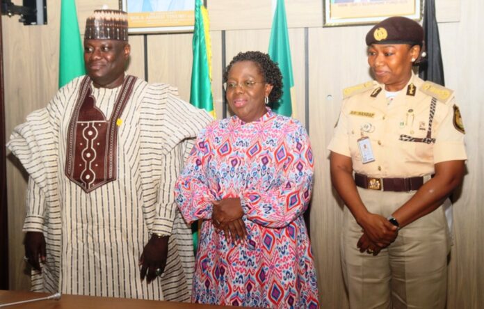 L-R: Permanent Secretary Federal Ministry of Aviation and Aerospace Development, Dr. Ibrahim Abubakar Kana mni; Permanent Secretary Federal Ministry of Interior, Dr. Magdalene Ajani and Comptroller General Nigeria Immigration Service, Kemi Nandap at the Event