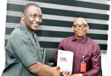 Right: Director-General, Bureau of Public Procurement (BPP) Dr. Adebowale A. Adedokun, FCIPS, ACFE, receiving membership Brochure from the Vice President, Nigerian Institute of Public Relations (NIPR) Prof. Emmanuel S. Dandaura, Fnipr during the NIPR visit to BPP in Abuja