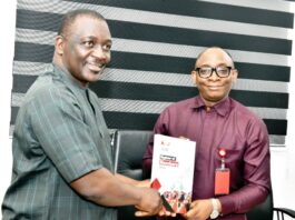 Right: Director-General, Bureau of Public Procurement (BPP) Dr. Adebowale A. Adedokun, FCIPS, ACFE, receiving membership Brochure from the Vice President, Nigerian Institute of Public Relations (NIPR) Prof. Emmanuel S. Dandaura, Fnipr during the NIPR visit to BPP in Abuja