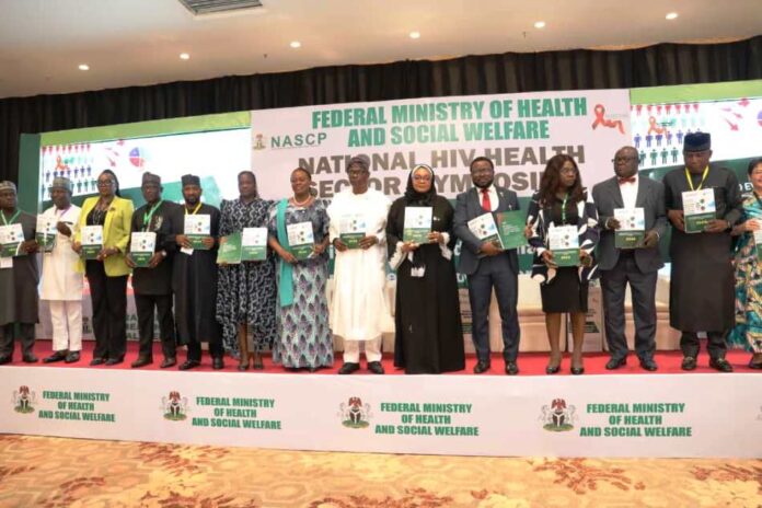 PMTCT Coverage Launch of the National HIV Policy Documents by the Representative of the First Lady Senator Oluremi Tinubu CON, represented by the Minister of Women Affairs Hajiya Imaan Suleiman-Ibrahim (Middle). To her right: Dr. Iziaq Adekunle Salako Honourable Minister of State for Health & Social Welfare; To her left: Dr. Adebobola Bashorun Director & National Coordinator HIV/AIDS, Viral Hepatitis And STIs Control Programme NASCP, Federal Ministry of Health & Social Welfare. With other major stakeholders and International Partners.