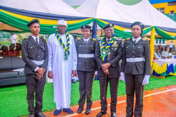 Police Students L-R: Graduand Ibrahim Isaac, Representative of Minister of Police Affairs, Mr. Ibrahim Mohammed (Director of Police Services), Best Graduating student, Ibrahim Halima Ogbadu, Commissioner of Police, Federal Capital Territory (FCT), CP Ajao Saka Adewale, and Graduand Atebo Joy Enyo’Ojo during the 1st Graduation Ceremony and Passing Out Parade of the 2024/25 academic session of the Police Day Secondary School Abuja, held at the School Sports Ground in Abuja.