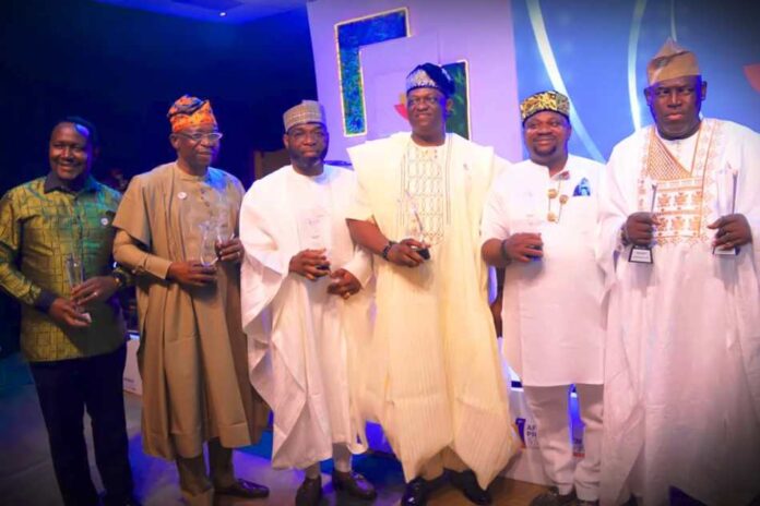 Procurement Director Bags Award11 R-L Director Procurement, Federal Ministry of Regional Development, Engr. Abdulrasheed A. Lawal, in a group photograph with other awards recipients at the Africa Procurement and supply chain summit and Awards 2025 held in Lagos, Nigeria.