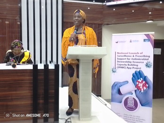 SPARC App "Nigeria Go Live on SPARC App" Programme: Representing the Honourable Coordinating Minister of Health and Social Welfare, Pharmacist Mrs. Olubunmi Aribeana Director Food & Drug Services Department of the FMoHSW. reading the Keynote address of Professor Muhammad Ali Pate CON, during the Launching ceremony inside the Auditorium Hall, Federal Ministry of Education.