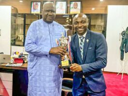 Presentation of the Trophy and Certificate of Merit won by Team Humanitarian as the Second Best KITTED at the July 2025 Edition of Keep fit Aerobics Exercise held at the Moshood Abiola National Stadium, Abuja. The presentation was made to the Permanent Secretary Federal Ministry of Humanitarian Affairs and Poverty Reduction, Dr Yakubu Adam Kofarmata, by the Director Humanitarian Resource Management of the Ministry, Onyia- Daisy CH, accompanied by the Sport Manager, kazeem Adenekan and other team members.