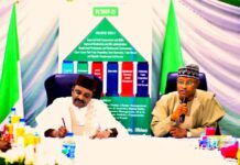 L-R, the Hon. Minister of Transportation, sen. Said Ahmed Alkali, noting the request his quest, the Governor of Kaduna state sen. Uba Sani was making to enable him to respond to the Governor.