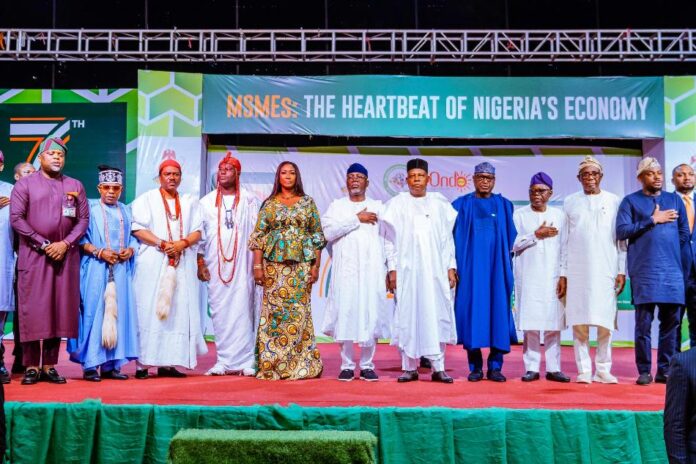7th MSMEs Clinic In Ondo Vice President Kashim Shettima (middle); Ondo State Governor, Mr Lucky Aiyedatiwa (6th from left); First Lady of Ondo State, Mrs Oluwaseun Aiyedatiwa (5th from left); Ooni of Ife, His Imperial Majesty, Oba Adeyeye Enitan Ogunwusi (4th from left); Deji of Akure, Oba Aladetoyinbo Ogunlade Aladelusi, Odundun II (3rd from left); Chairman of the Ondo State Council of Traditional Rulers, the Olowo of Owo, Oba Ajibade Gbadegesin Ogunoye III (2nd from left); Special Adviser to the President on Economic Matters, Dr. Tope Fasua (far left); Governor of Ekiti State, Biodun Oyebanji (4th from right); Deputy Governor of Ondo State, Dr. Olayide Adelami (3rd from right); Senator Representing Osun East Senatorial District, Fadahunsi Francis Adenigba (2nd from right); and Special Adviser to the President on Job Creation and MSME, Mr Temitola Adekunle-Johnson (far right), during the launch of the 7th Expanded National MSME Clinics in Akure, Ondo State, on Tuesday (5/08/2025).