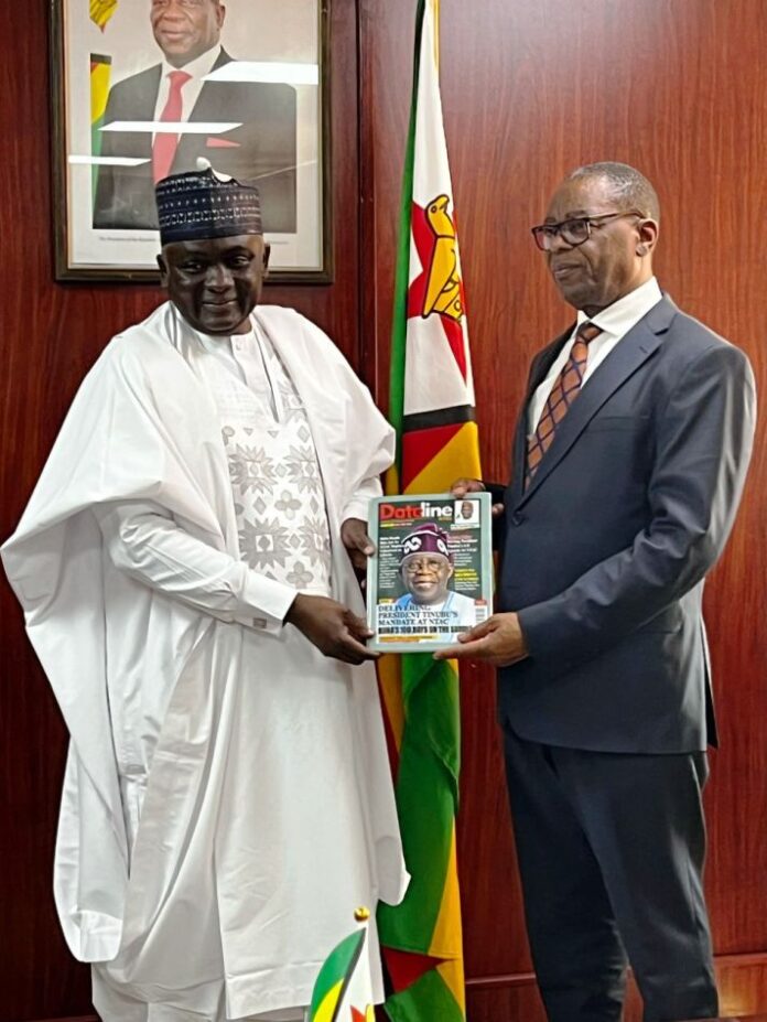 Agency's Delegation Visits Zimbabwe1 NTAC DG, Rt. Hon. Yusuf Buba Yakub,* as he presents the NTAC in-house Magazine, *DatelineNTAC* to the Zimbabwe's Minister of Health and Child Care, Dr. Douglas T. Mombeshora during a visit to the Ministry by a delegation led by the DG on Wednesday, August 6, 2025.