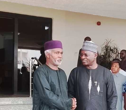Honorable Minister of Foreign Affairs, Amb. Yusuf Tuggar in a handshake with the DG IPCR, Dr. Joseph Ochogwu