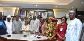The Permanent Secretary of the Ministry, Dr Marcus Olaniyi Ogunbiyi (C), and members of the Committee during the Inauguration.