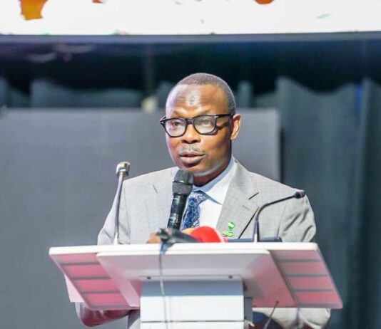 Dr. Iziaq Adekunle Salako Honourable Minister of State for Health & Social Welfare delivering his keynote address at the Maiden Dental Technologists Summit 2025, held at the Nigeria National Merit House, Maitama Abuja