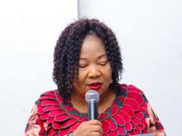 The Director Overseeing the Office of the Permanent Secretary Transportation Musa Ibrahim. Represented by Dr. Vivian Nwosu. Director, Special Duties in the Ministry. Presenting a remark during the ACTU Inauguration in the conference room of the ministry. 26-08-2025.