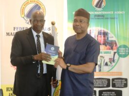 R-L The Managing Director/CEO, FERMA; Engr. Emeka Agbasi. Ph.D; FNSE; receiving the ACTU manual from Olusegun Adigun, Director SSRD (ICPC) representative of the Chairman ICPC