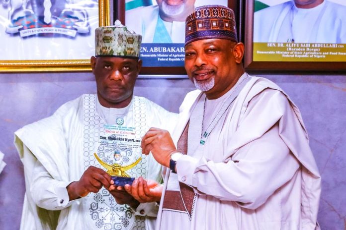 FMAFS, AFGSAN Partner L -R, the AFGSAN Chairman, Alhaji Haruna Ahmed Fanbeguwa and Minister of Agriculture and Food Security, Sen Abubakar Kyari during the couresty visit in Abuja.