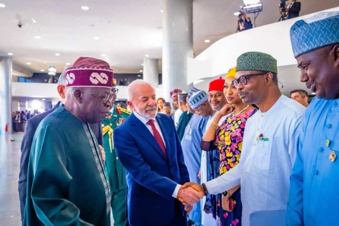 Five-Year Joint Action Plan President Luiz Inacio Lula da Silva in a warm handshake with Dr. Iziaq Adekunle Salako Honourable Minister of State for Health & Social Welfare.