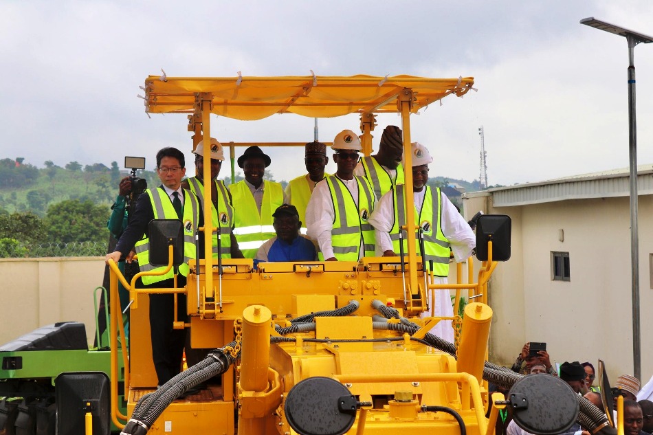The Hon Minister of State for Works Hon Bello Goronyo Esq. along with MD/CEO Engr. Chukwuemeka Agbasi, FNSE FERMA and other dignitaries test-riding one of the equipments during the commissioning