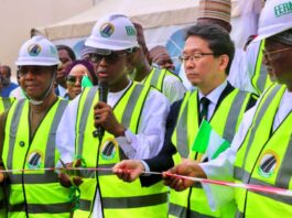 The Honourable Minister of State for Works, Hon. Bello Muhammad Goronyo., Esq.(Middle ) flanked by the Managing Director Of FERMA, the Japanese Ambassador, Senate Committee chairman on FERMA, and other stakeholders while cutting the Ribbon during the Commissioning of the Japanese Donated Road Maintenance Equipment In Abuja. 1st August, 2025.