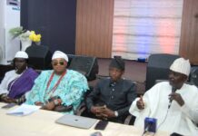 Front row (inset): RMAFC Chairman, Federal Commissioners, and some stakeholders at the occasion