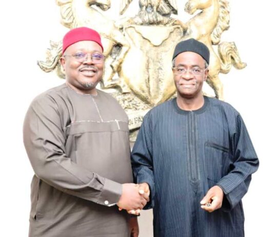 The PS FMSDIGA, Dr. Onwusoro Maduka Ihemelandu in a hand shake with the Director General Budget Office of the Federation Mr Tanimu Yukubu